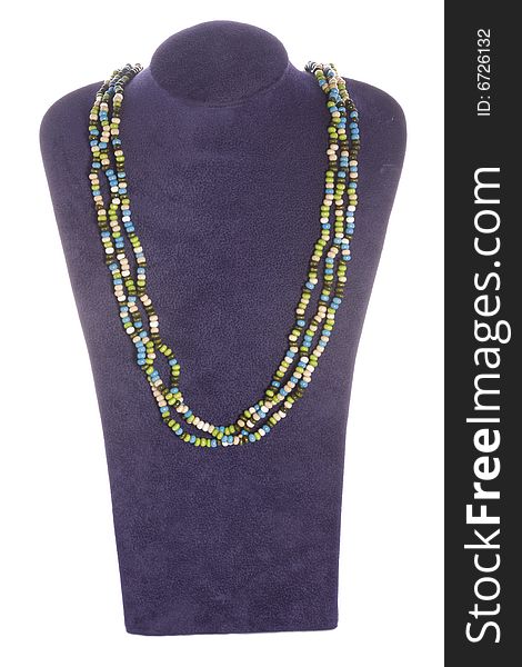 Colorful beads made necklace with self-standing display on white background