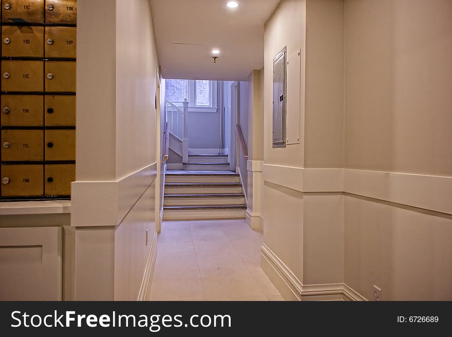 Back hall and stairwell inside luxury condo building in boston massachusetts