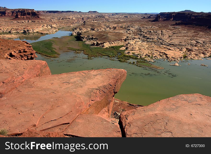 View of badlands of drought-ridden Lake Powell across from Hite Marina.