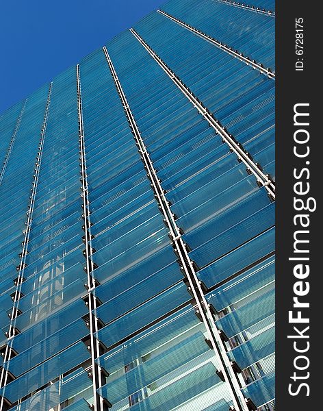 Detail view of some glass sunshades of a modern building. Detail view of some glass sunshades of a modern building.