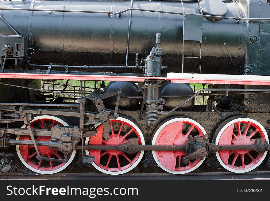 Red wheels of steam locomotive. Red wheels of steam locomotive