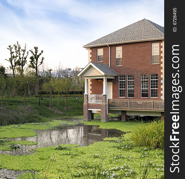 Over water single story bungalow.