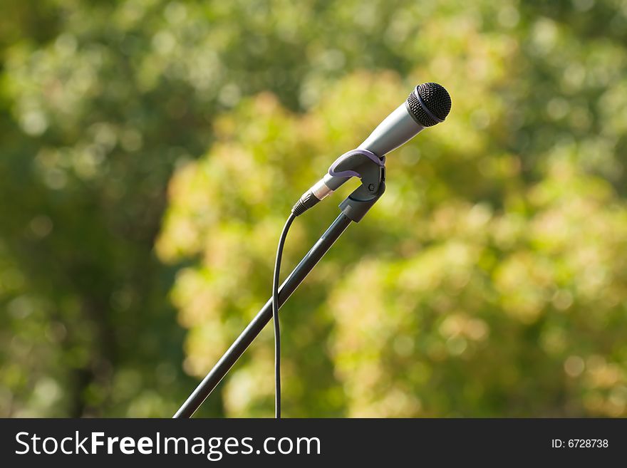 Microphone On Green Background