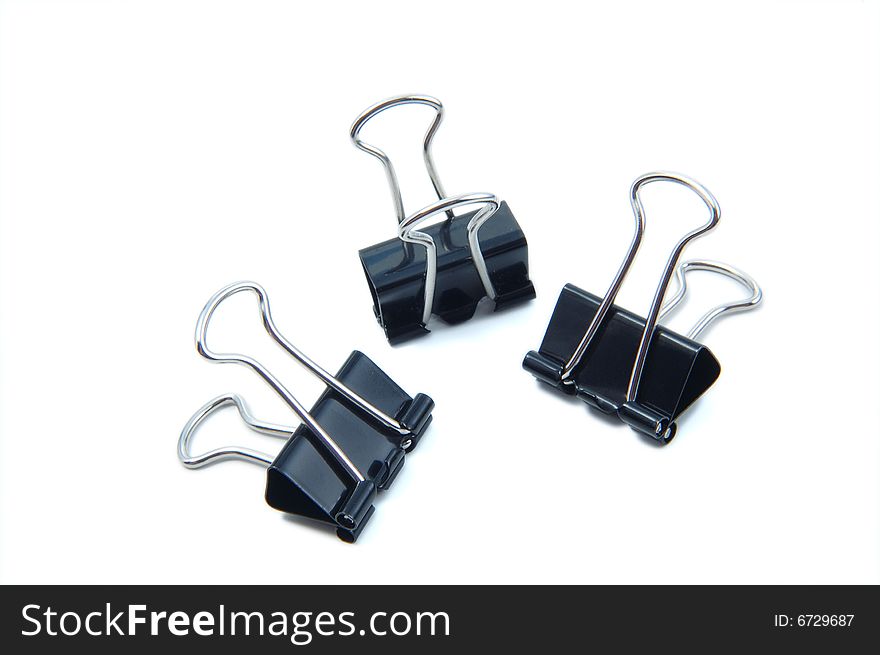 Three small document clips on a white background