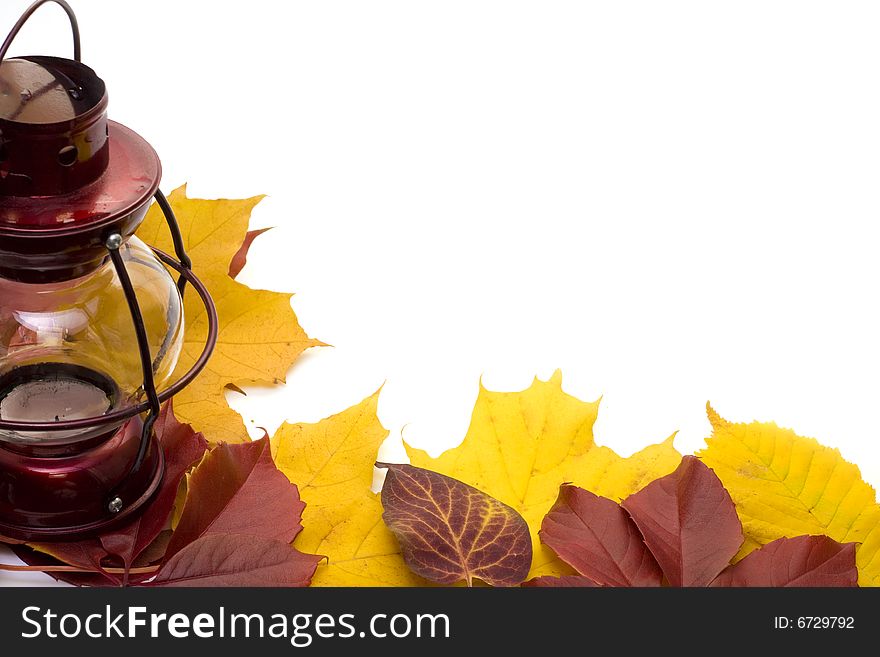 Lamp and leafs over white