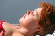 Woman Tanning Stock Photography