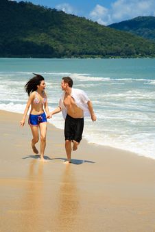 Running On A Paradise Beach Stock Photos Running On A Paradise Beach Stock Photos
