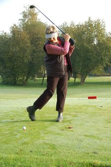 Female Golfer Teeing Off Stock Image Female Golfer Teeing Off Stock Image