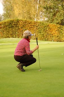 Female Golfer Checking Course Stock Photo Female Golfer Checking Course Stock Photo