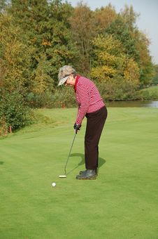Female Golfer Putting Stock Photography Female Golfer Putting Stock Photography