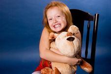 Pretty Ginger Girl With A Toy Stock Photos