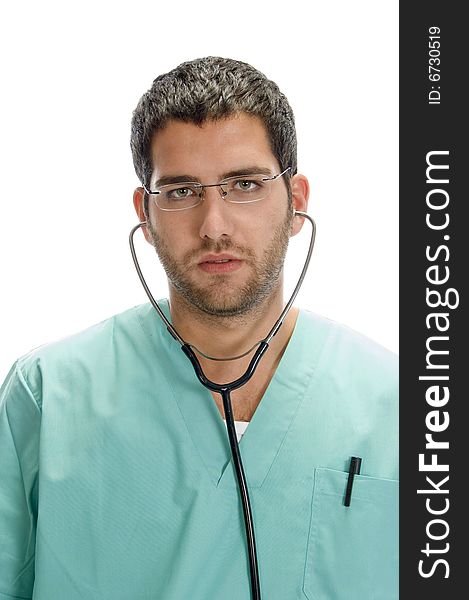 Doctor with stethoscope in his ears with white background