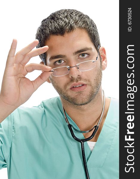 Doctor holding spectacles with white background