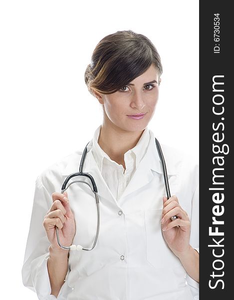 Lady doctor holding stethoscope against white background