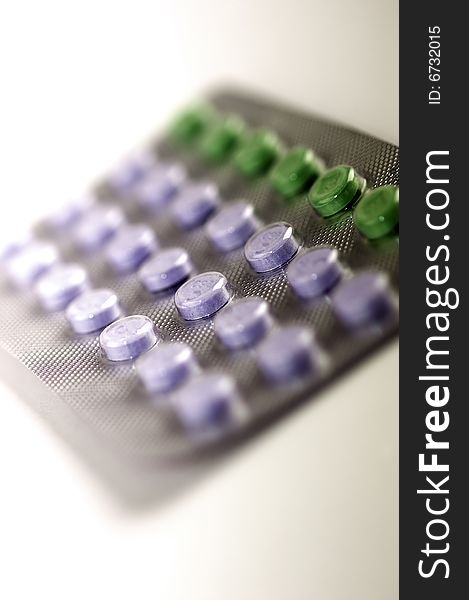 Green and purple tablets with selective focus