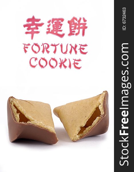 A broken fortune cookie isolated on a white background