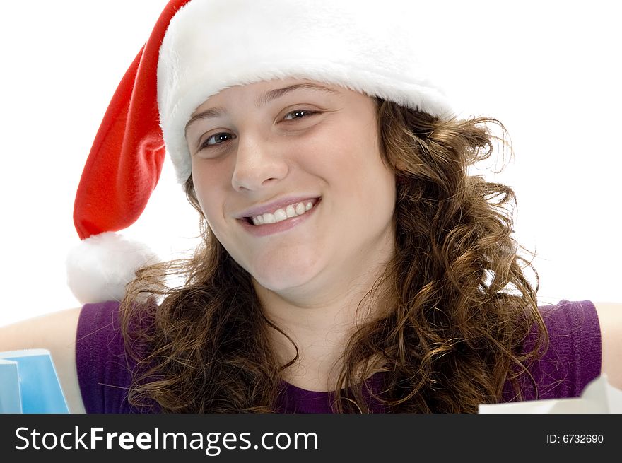 Cheerful woman with santa cap on an isolated background