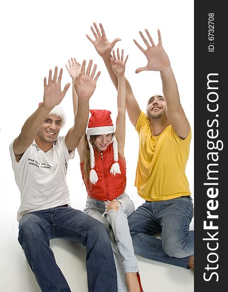 Young friends with raised hands with white background