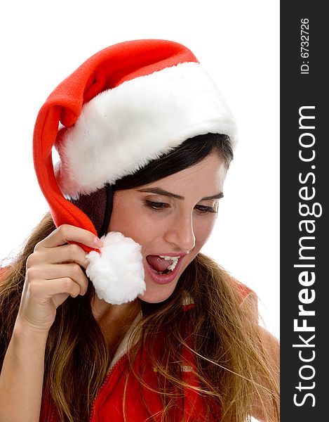 Woman with santa cap and looking downward on an isolated white background