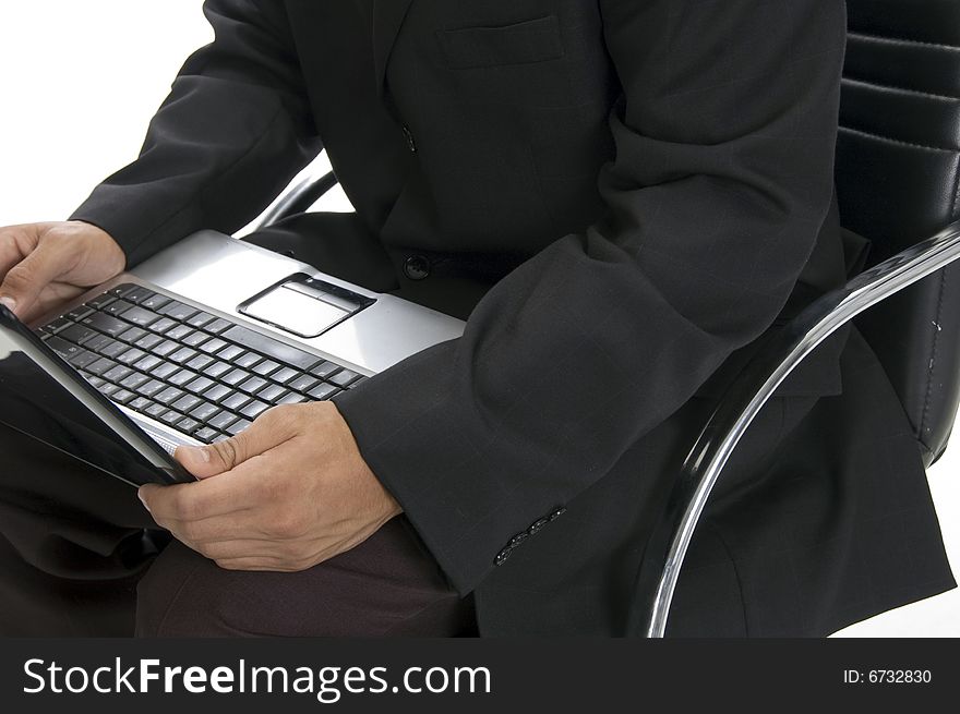 Male hands typing an a laptop close up with white background