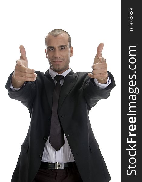Cool successful businessman posing against white background