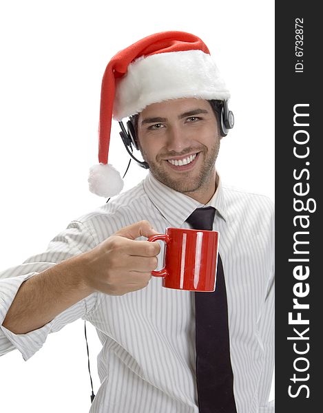 Young man enjoying coffee and wearing santa cap isolated on white background