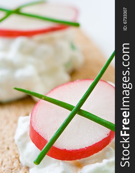 Cottage cheese on crispbread with radish. Cottage cheese on crispbread with radish