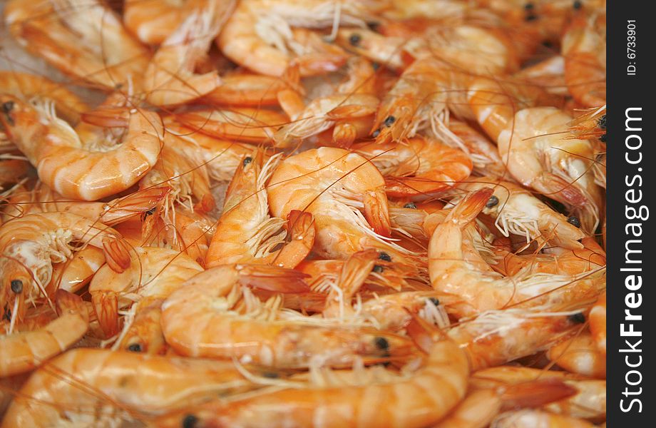 Fresh prawn shrimps on display as a background in market in France