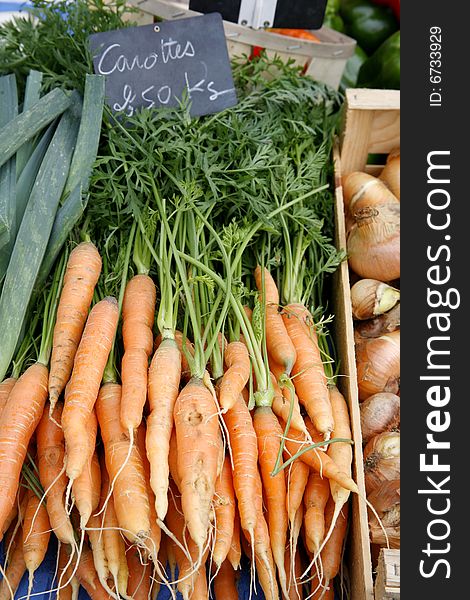 Bunch of fresh carrots at market in the south of France