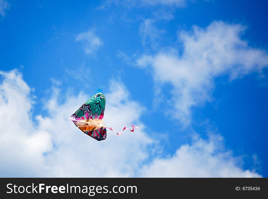 A child's kite flying through the sky. A child's kite flying through the sky