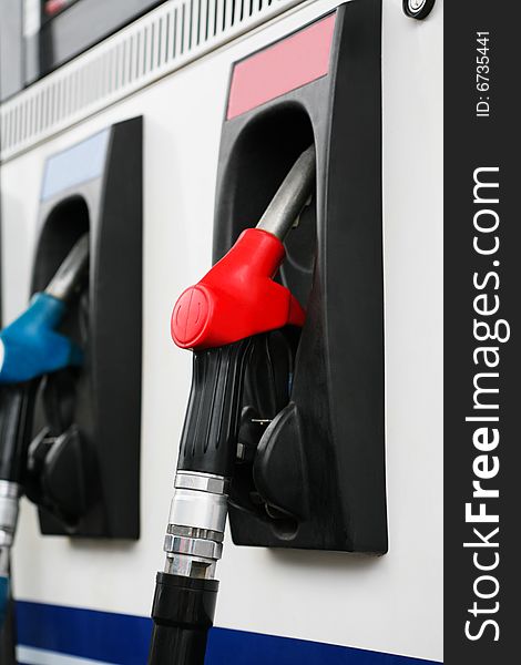 Refueling hose at modern petrol filling station