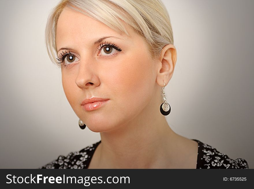Gorgeous face of female on gradient background. Gorgeous face of female on gradient background