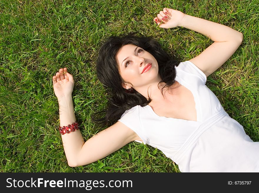 Woman rest on the grass