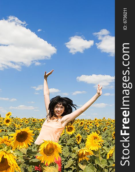 Woman In The Field Of Sunflowers