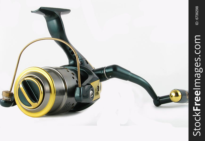 A modern fishing reel presented on white background.