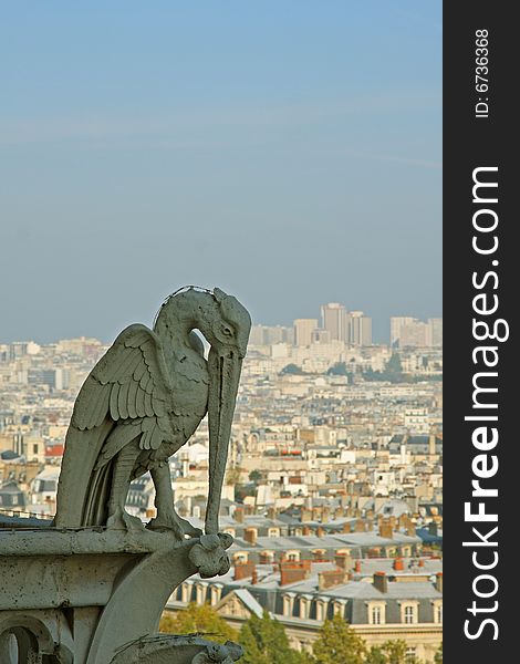 The Gargoyles of Notre Dame looking out over Paris