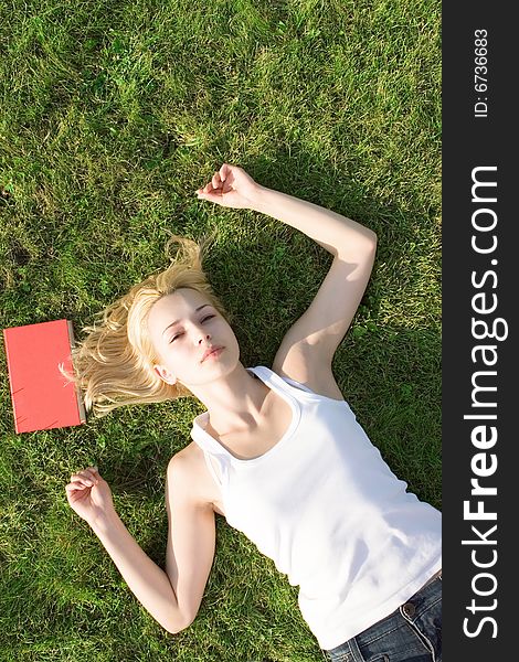 Blonde With Book In The Park