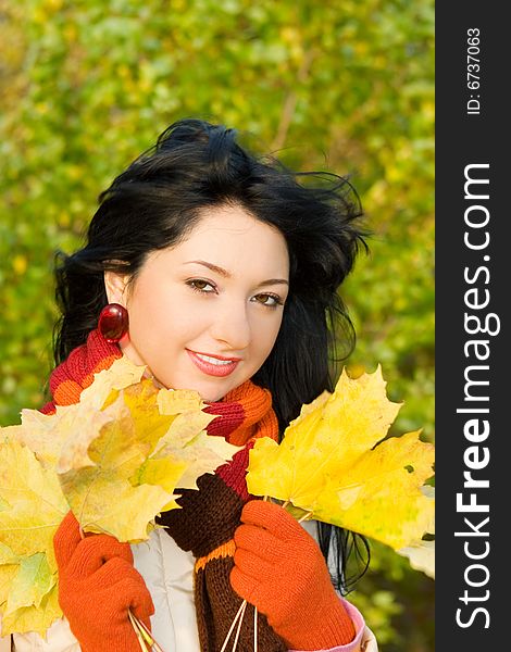 Young Woman In The Autumn Park