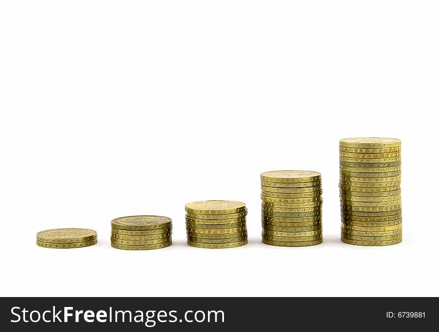 Stacks of gold coins, in an upward trend. Stacks of gold coins, in an upward trend.