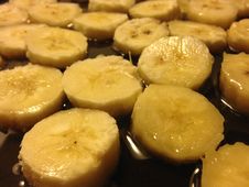 Sliced Bananas On Frying Pan In Oil. Stock Photography Sliced Bananas On Frying Pan In Oil. Stock Photography