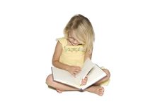 Little Girl Reading Stock Image