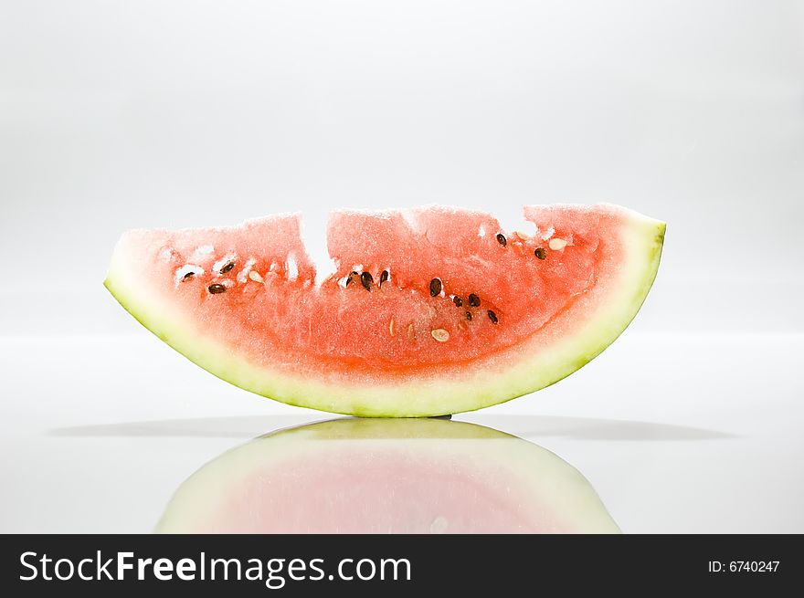 Water-melon piece on white table