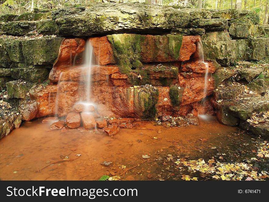 This is an Autumn scene. It has waterfalls,leaves and other naturally occurring items popular in fall scenes. This is an Autumn scene. It has waterfalls,leaves and other naturally occurring items popular in fall scenes.