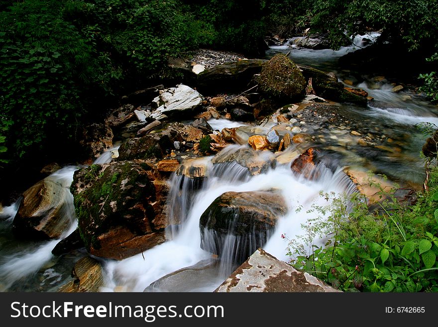 Gorgeous river and waterfall amidst rainforest. Gorgeous river and waterfall amidst rainforest