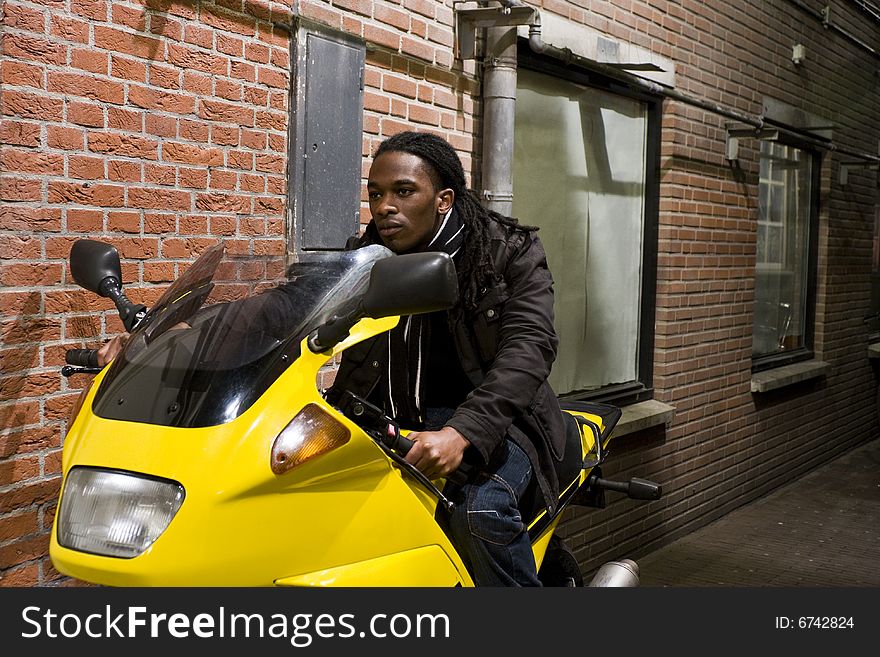 Young Urban African American Male On Motorcycle