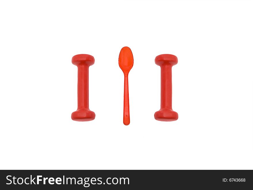 Two barbells and red plastic spoon isolated on white