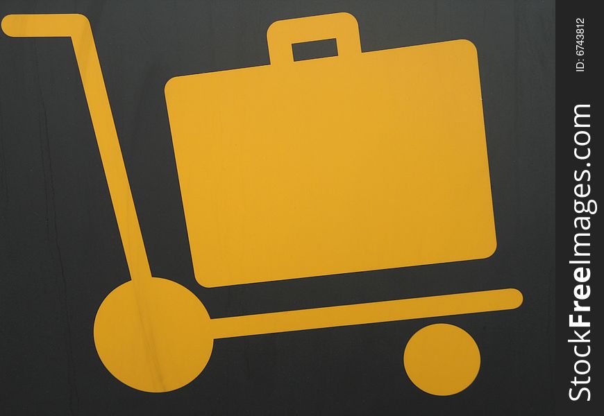 Yellow and black airport cart sign