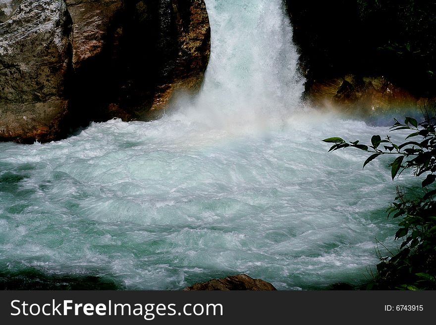 Gorgeous river and waterfall in a pool of rainbows. Gorgeous river and waterfall in a pool of rainbows