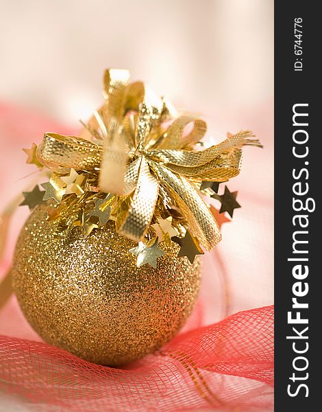 Golden christmas ball. holiday background