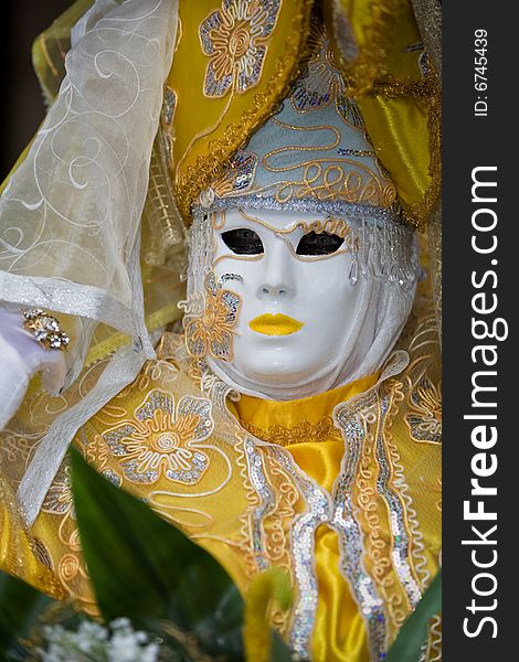 Yellow costume at the Venice Carnival. Yellow costume at the Venice Carnival